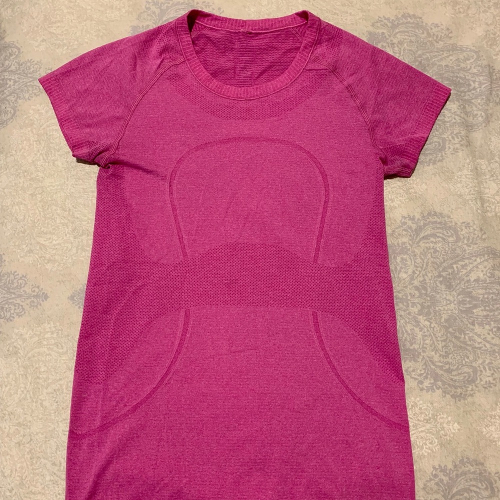 Pink Lululemon athletic shirt